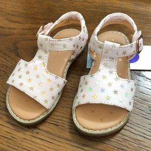 New baby girls Kinsey sandals. Size 6. Blush color with metallic gold stars.